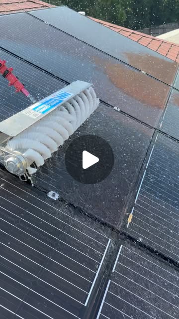 Solar panel cleaning reel